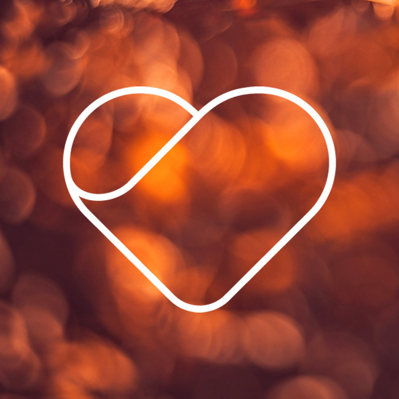 Logo of Heart Check over a blurred background